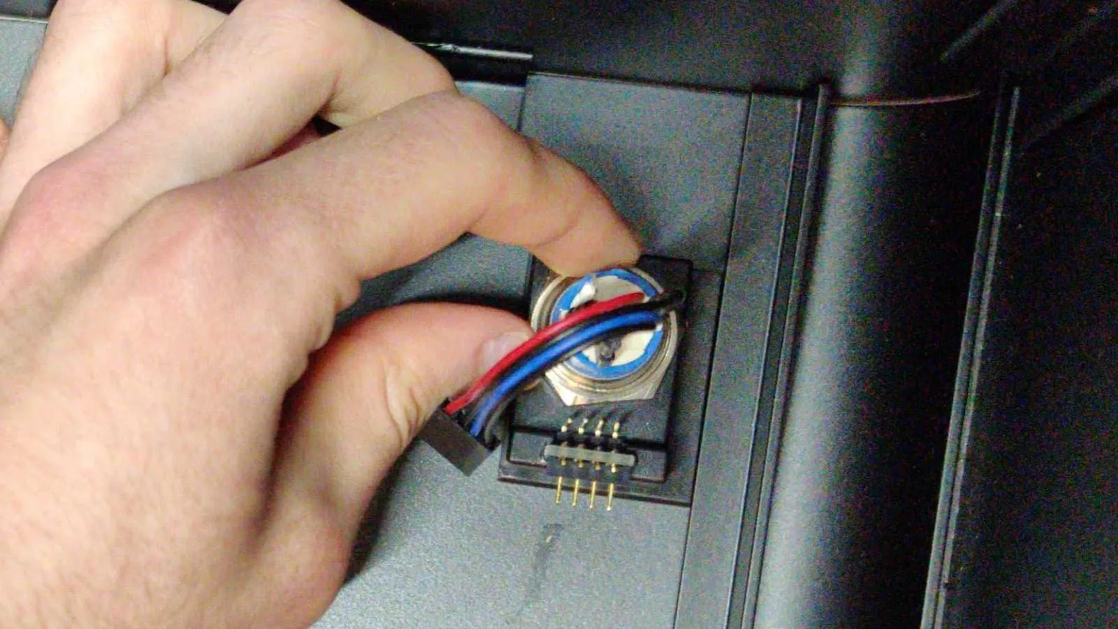Unscrewing the button