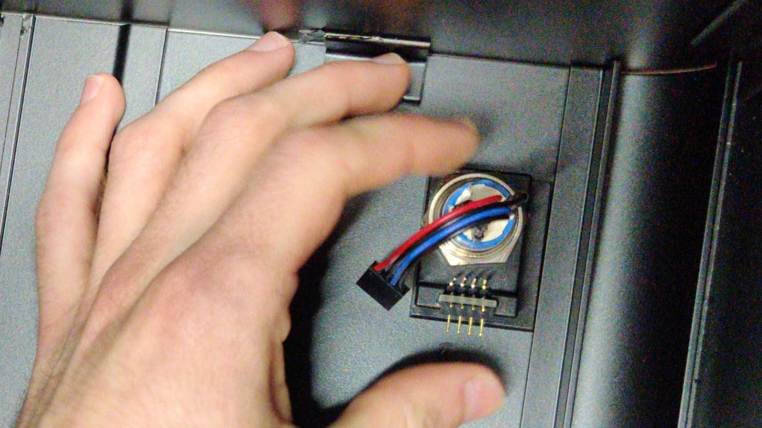 Screwing in the power button