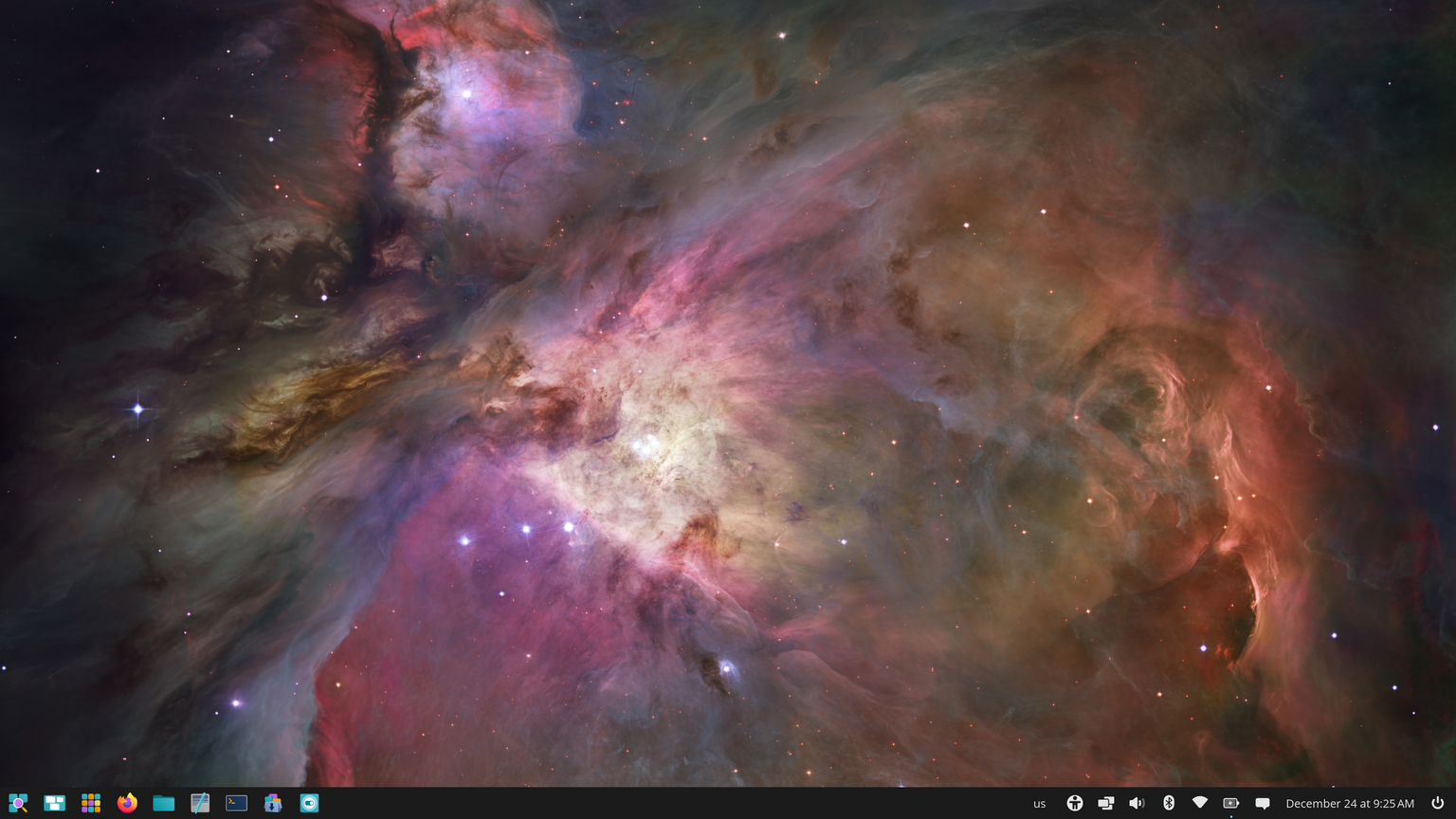 Pop 24.04 desktop after initial setup is complete, with the bottom panel layout selected.