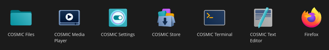 Default Application icons in Pop!_OS lined up. From left, COSMIC Files, COSMIC Media Player, COSMIC Settings, COSMIC Store, COSMIC Terminal, COSMIC Text Editor, Firefox