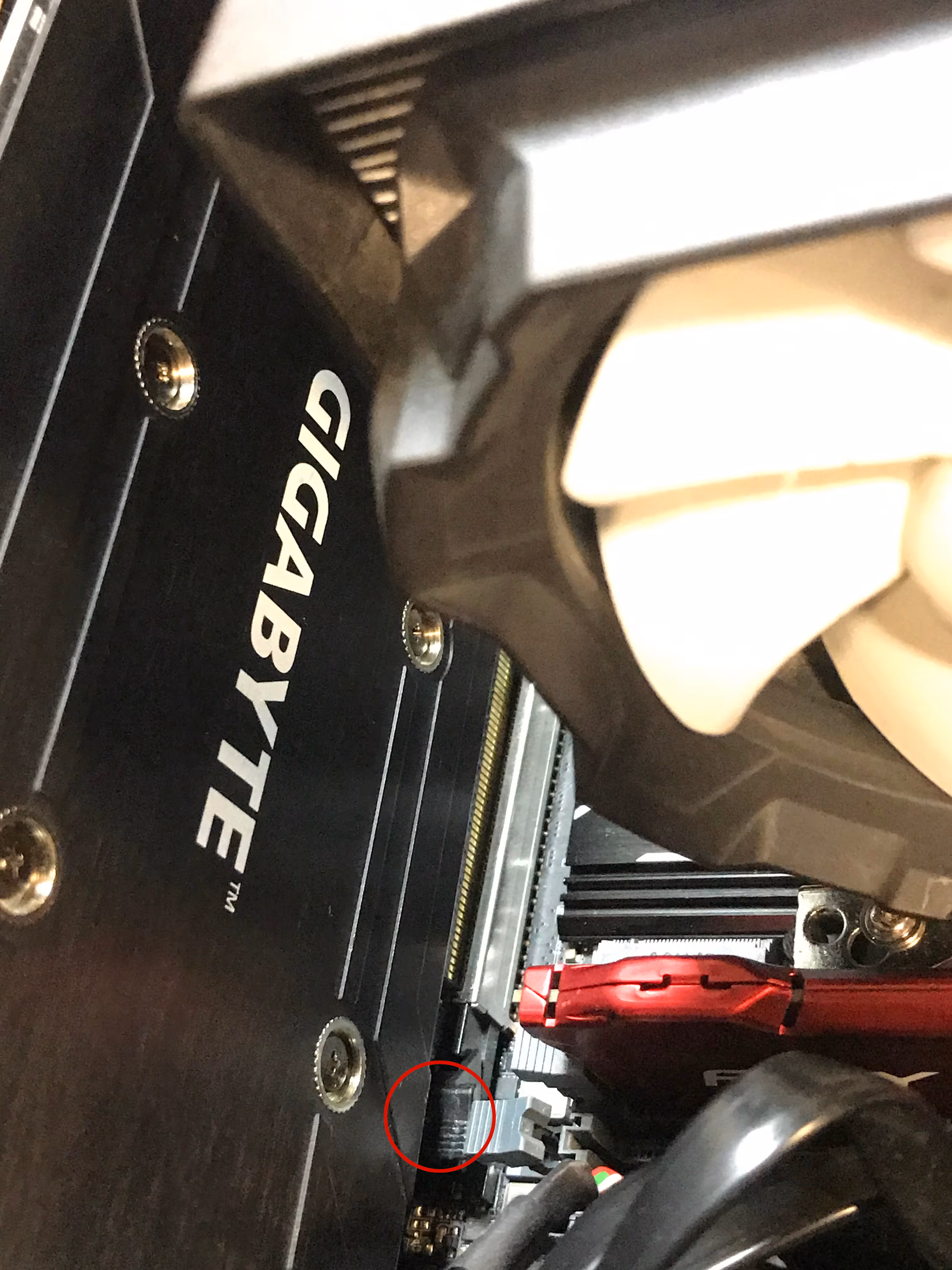 Close view of the GPU leaving the PCIe slot