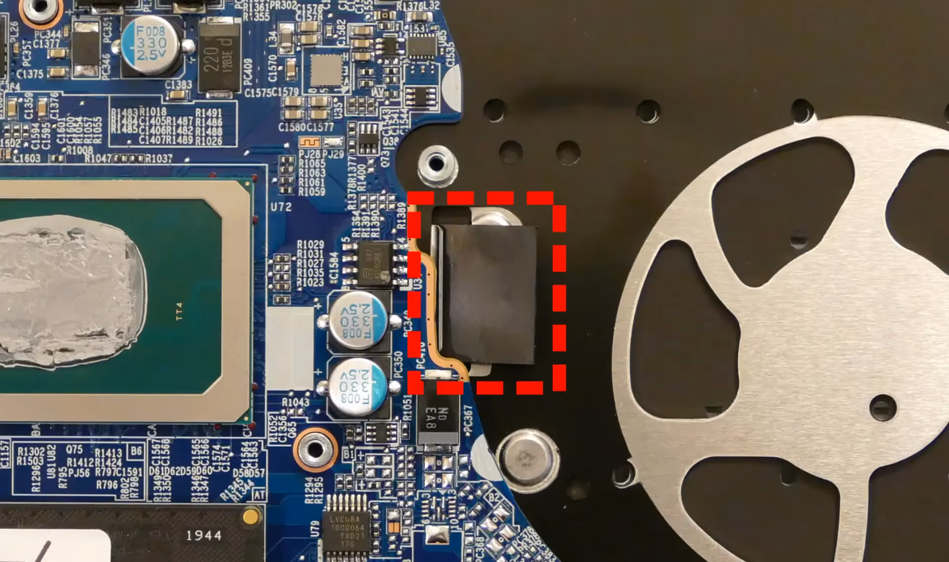 Keyboard adhesive behind fan