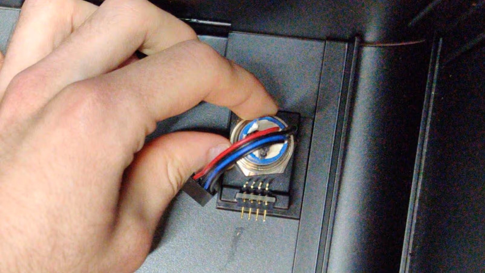 Once loose, the nut can be unscrewed with fingers