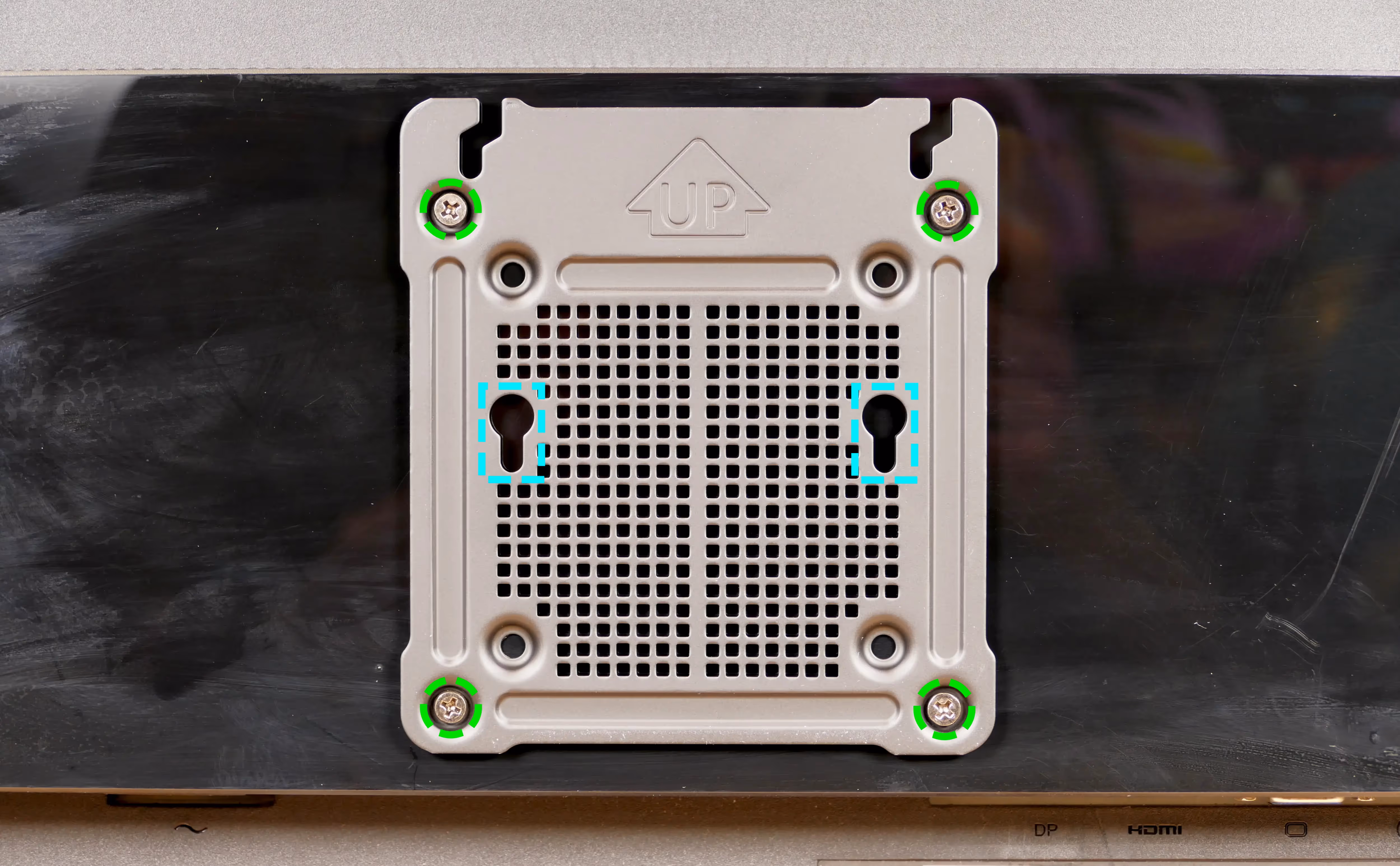 VESA mounting plate on display