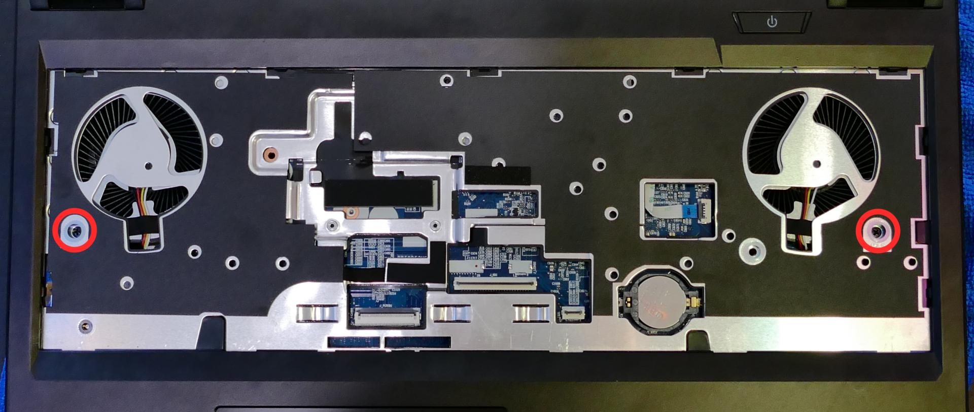 Under-keyboard screws