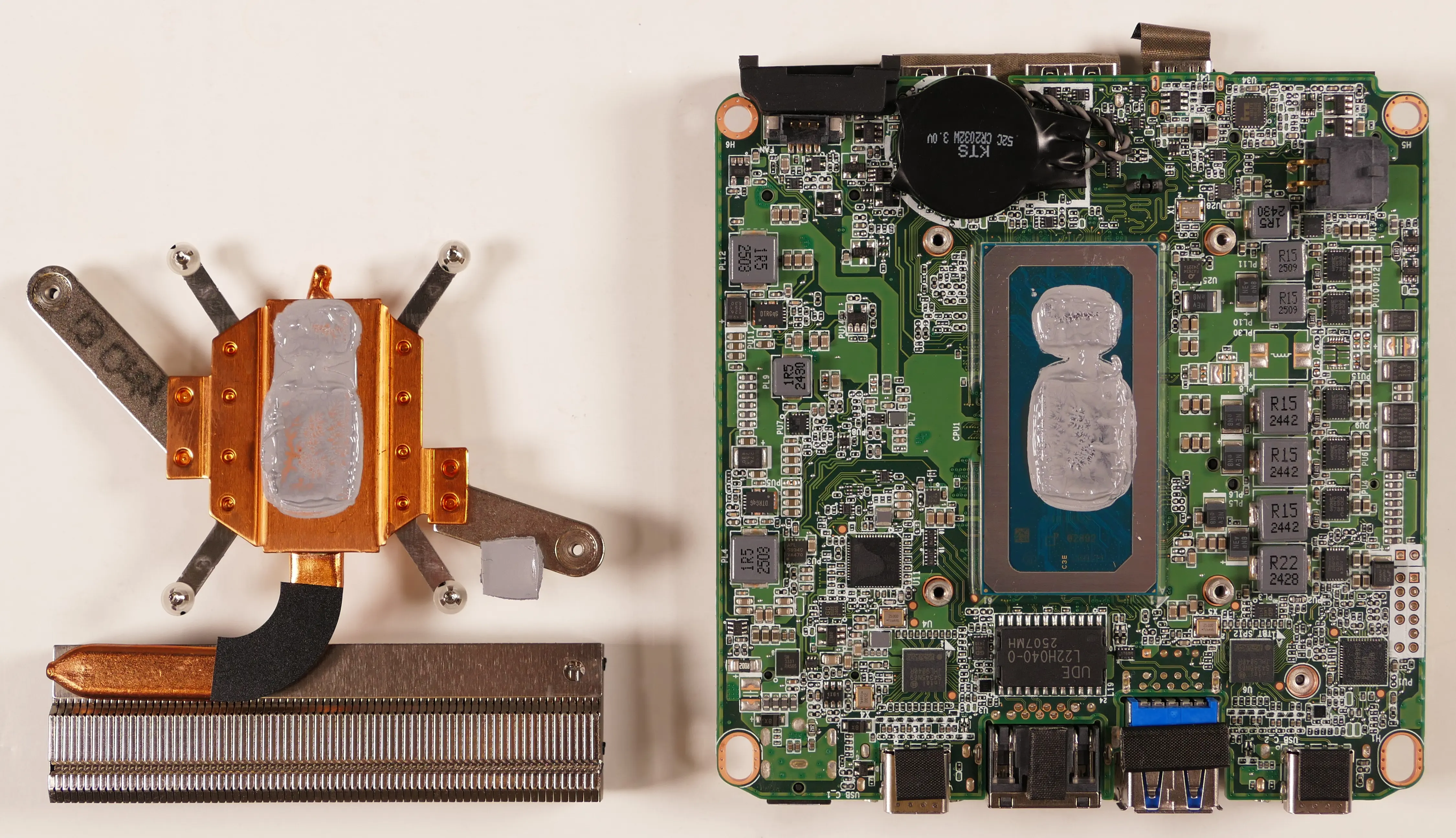 Motherboard and heatsink, before cleaning