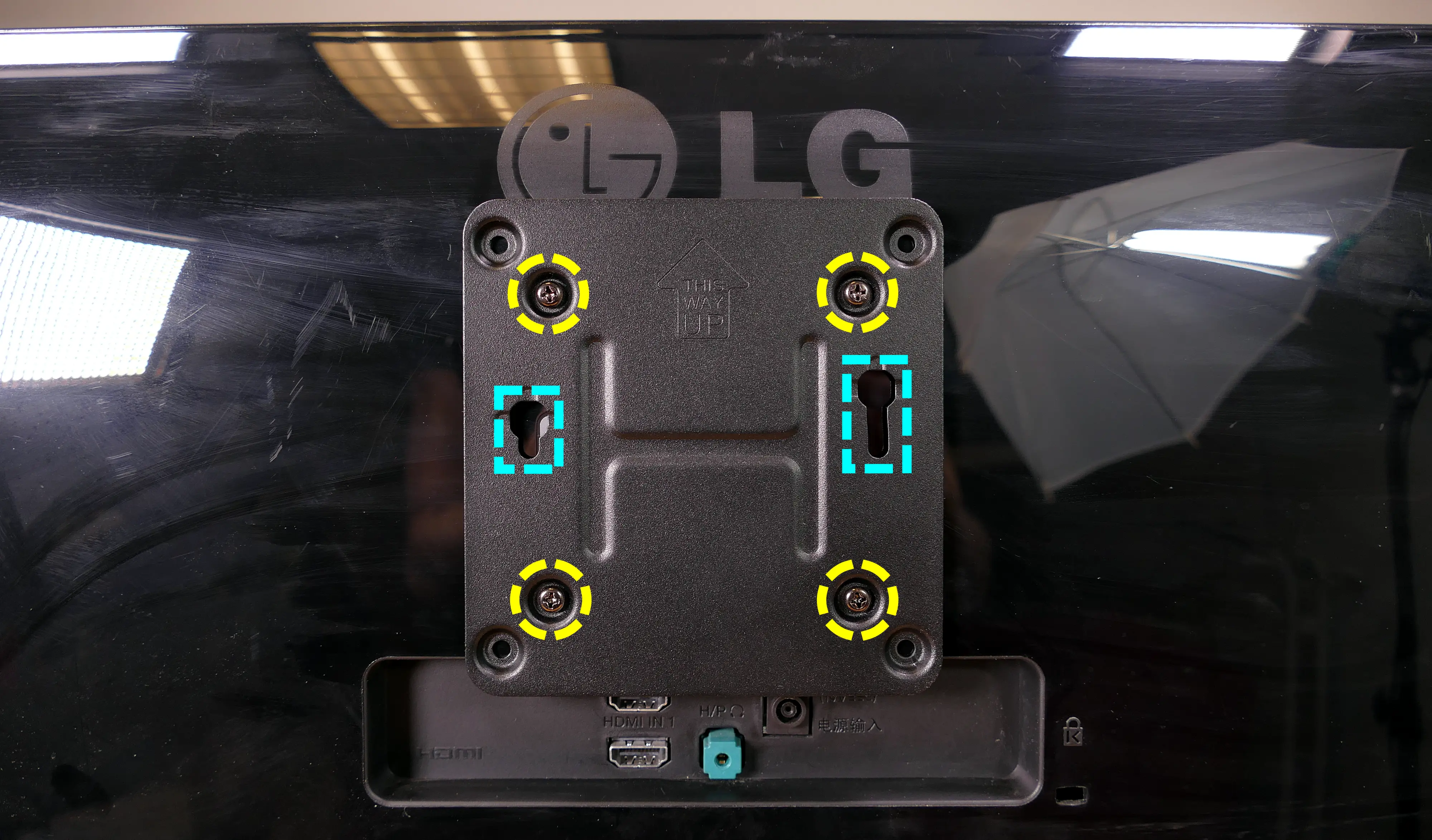 VESA mounting plate on display