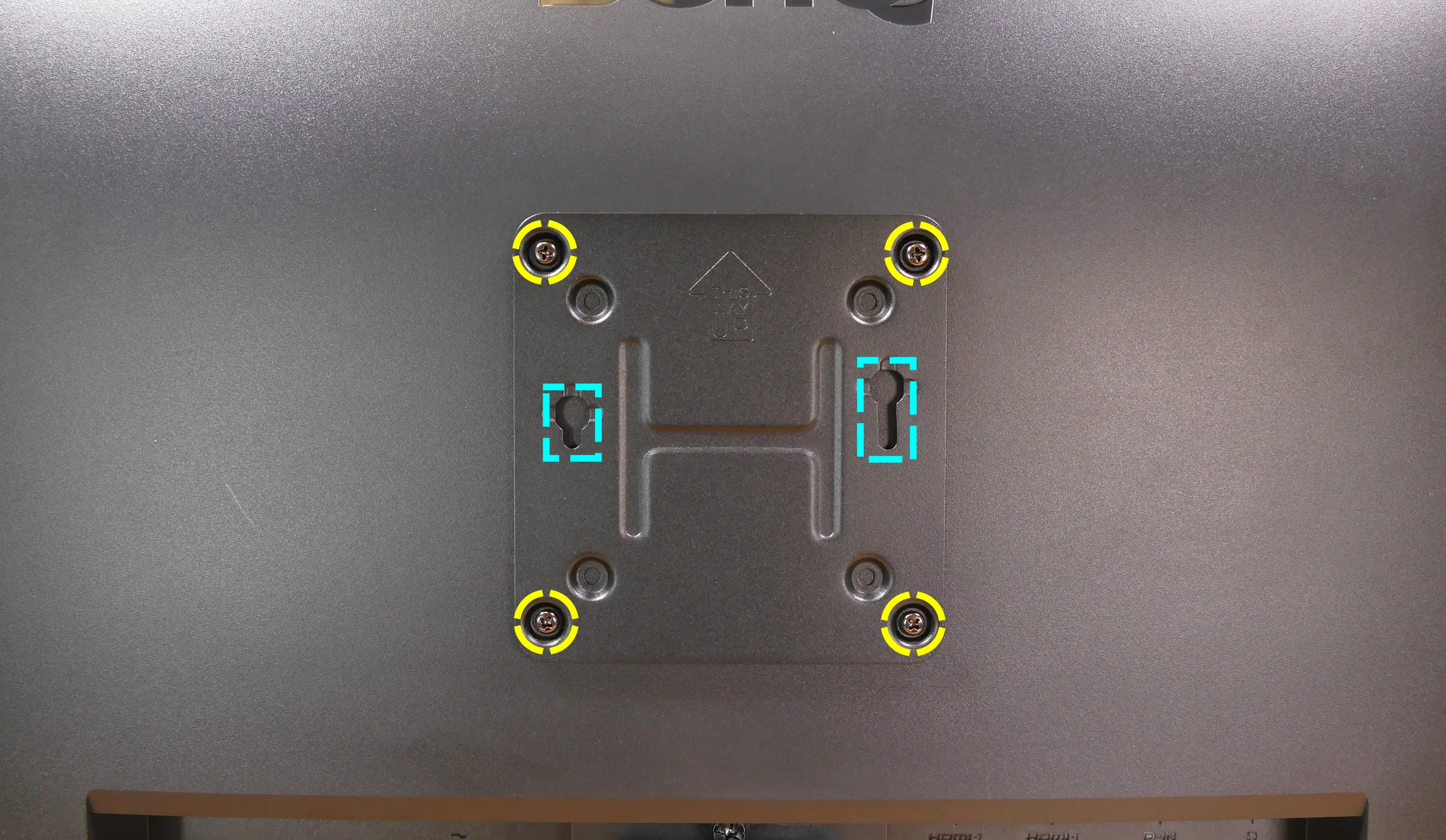 VESA mounting plate on display