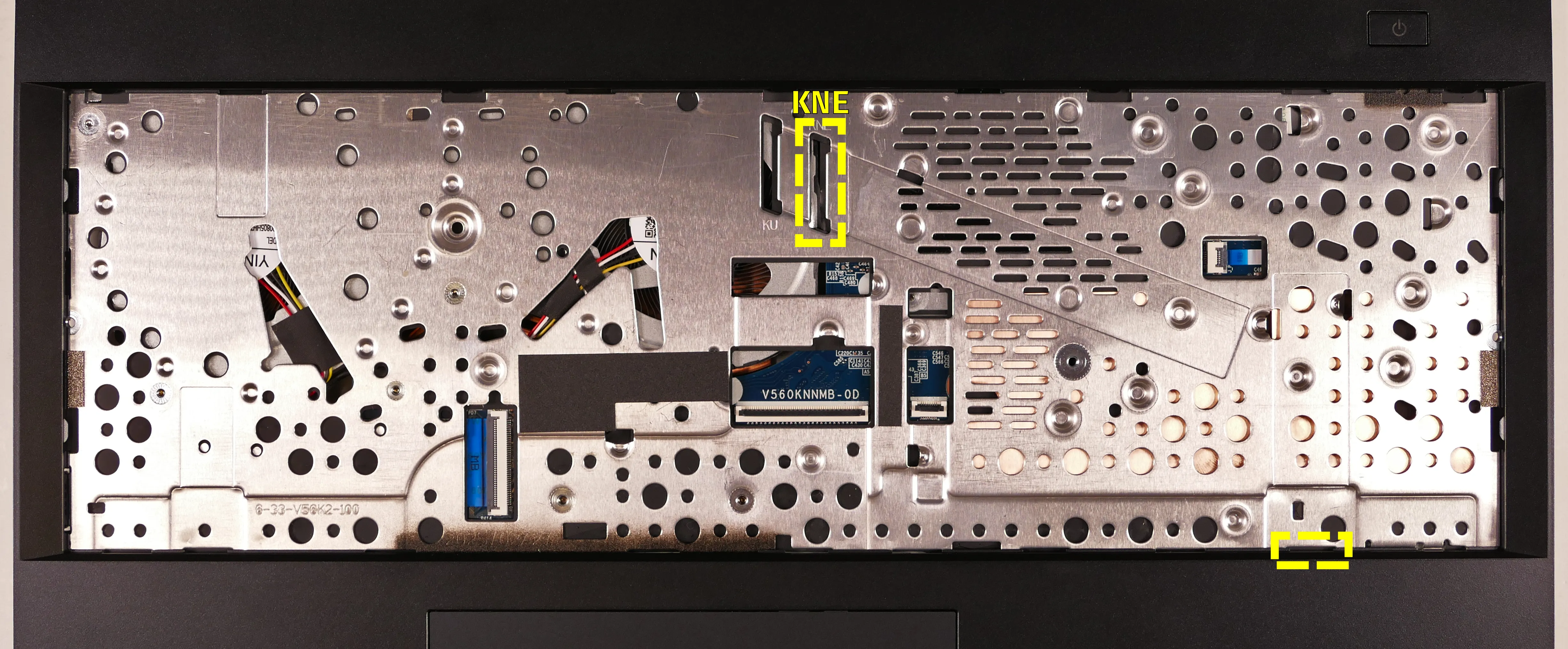 Keyboard adhesive slots