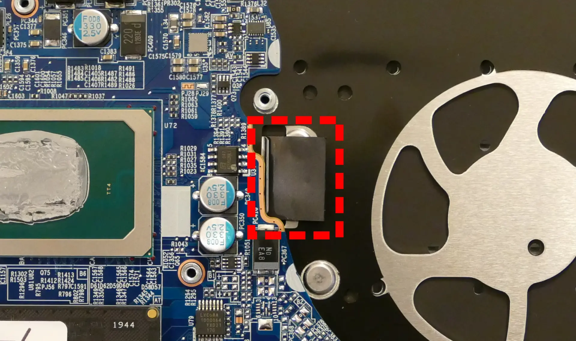 Keyboard adhesive behind fan