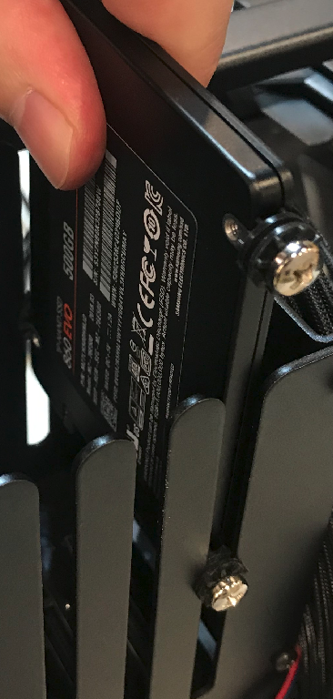 Inserting the drive in to the cage slot