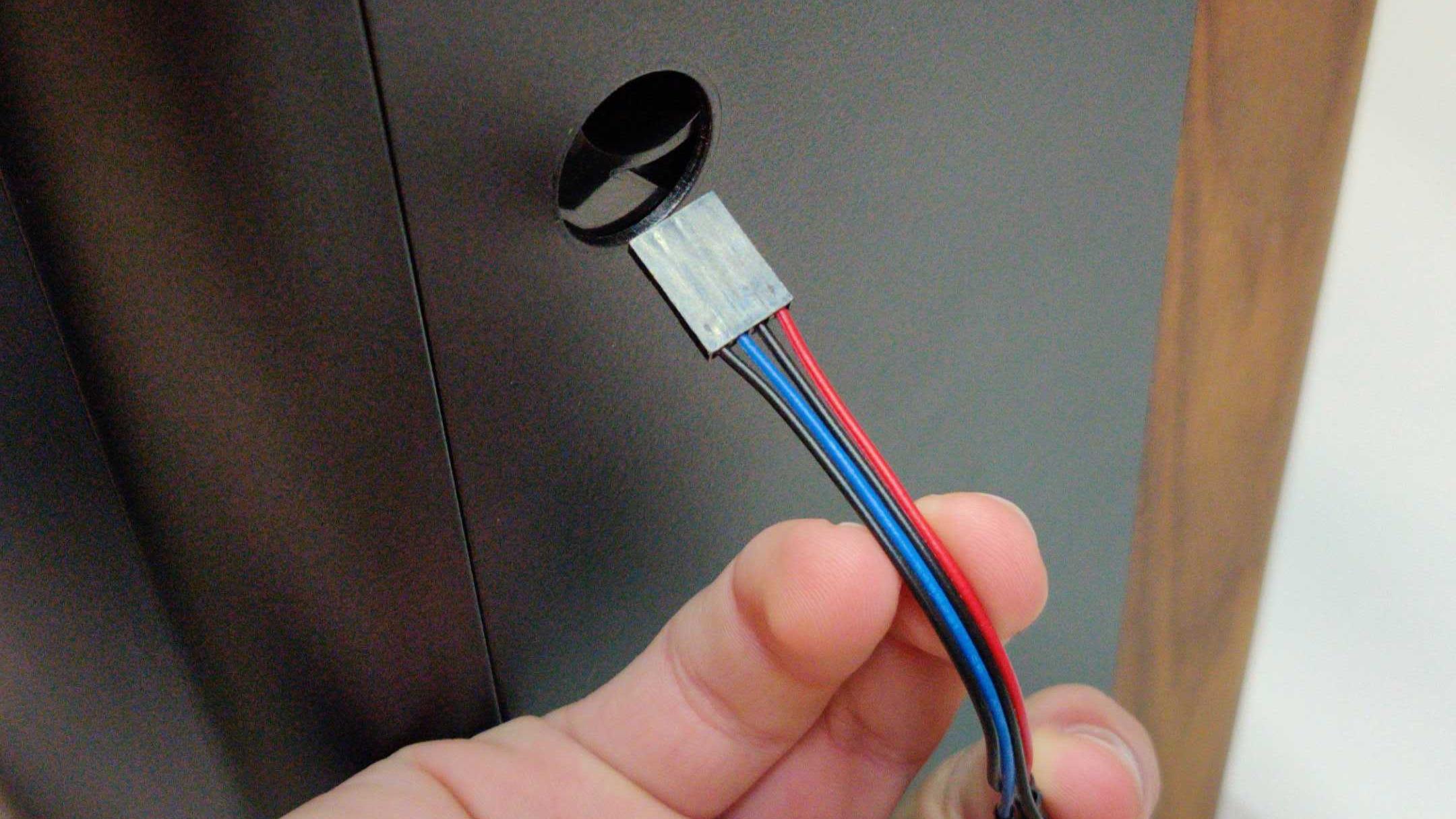 Inserting power button cables