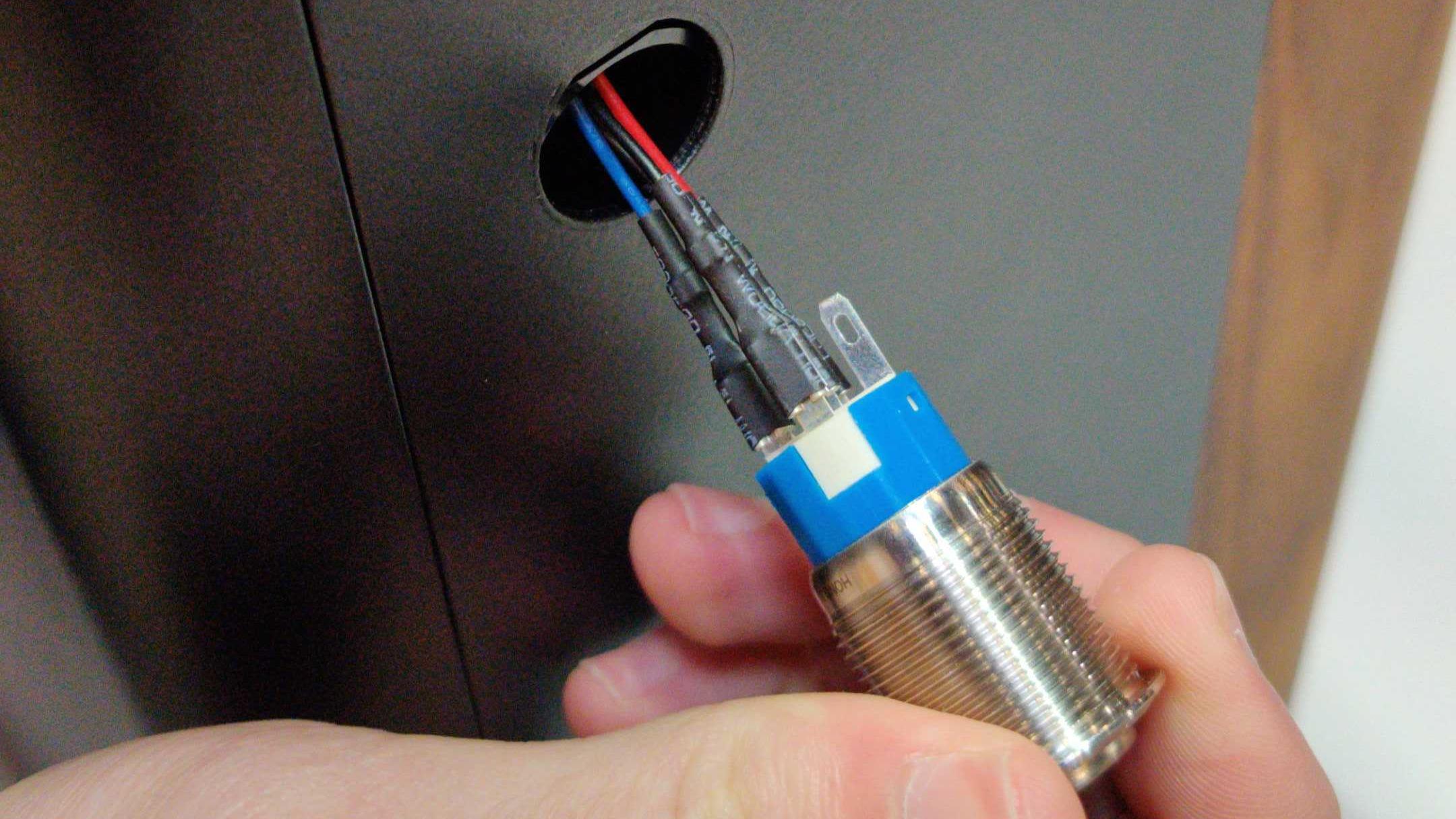 Button removed through Top Case hole