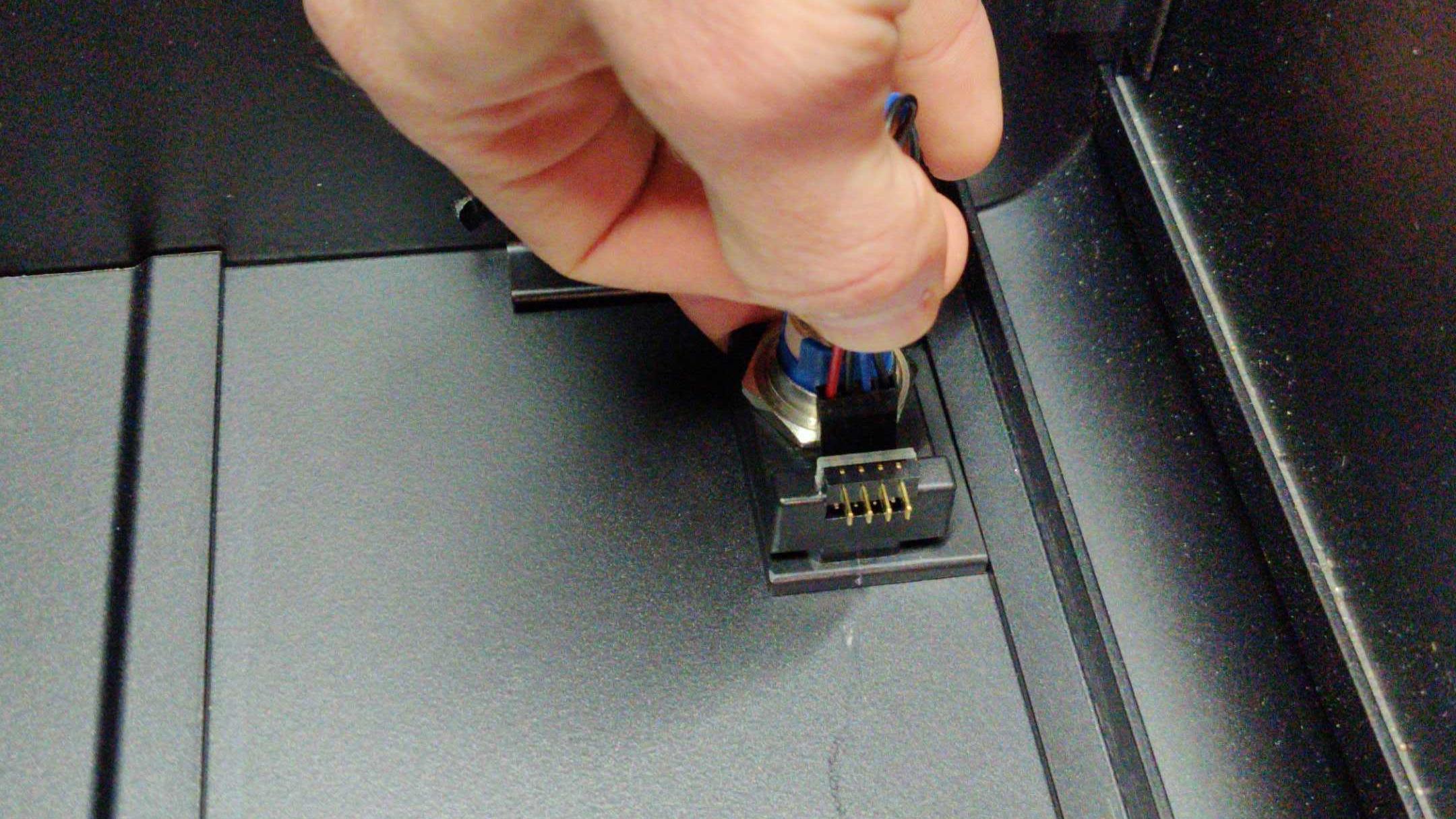 Unplugging power button from 90-degree connector