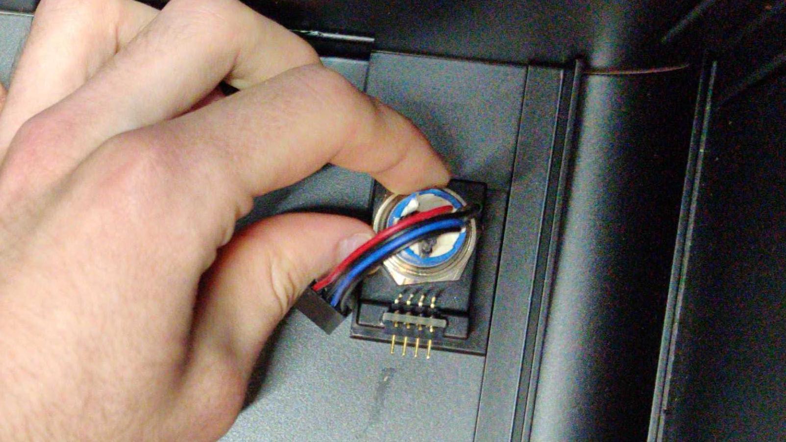 Once loose, the nut can be unscrewed with fingers