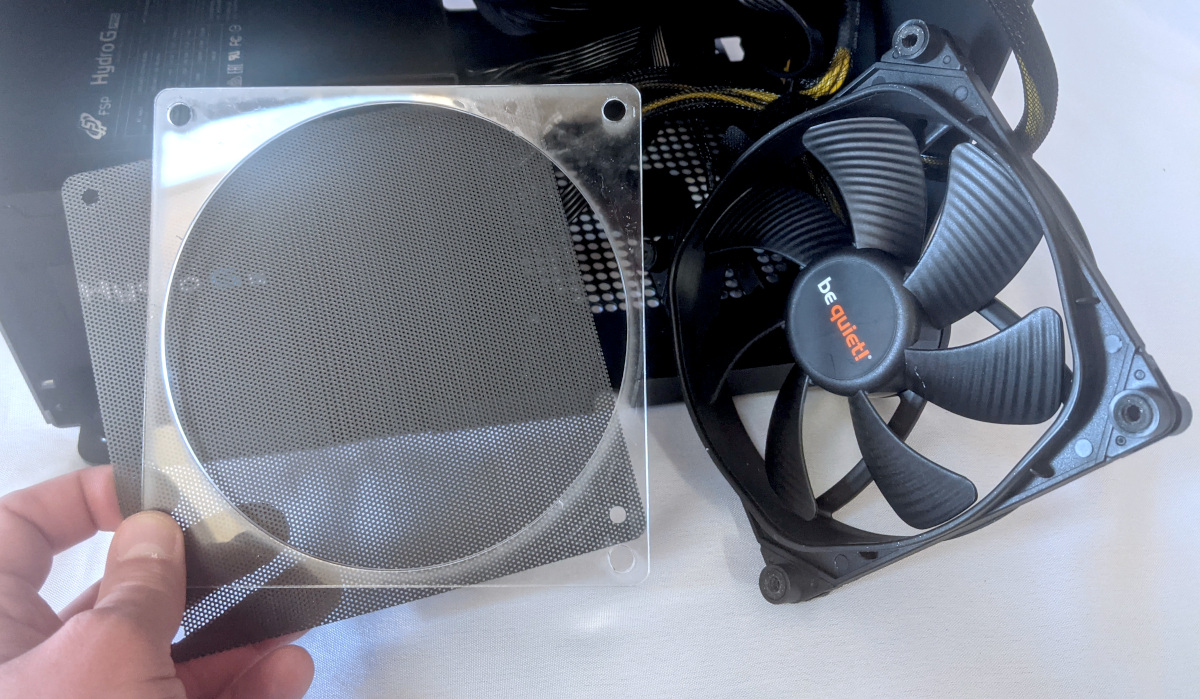 Fan spacer and dust filter